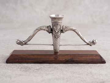 Ram Dhanush agarbatti stand in pure silver plating on a wooden stand