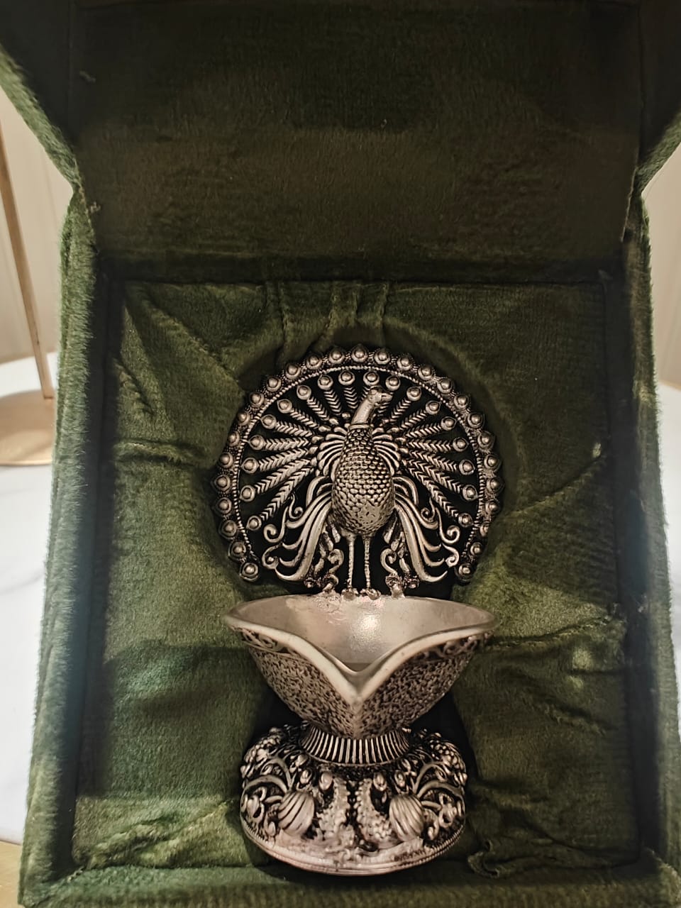 Elegant Silver Peacock Diya – Handcrafted Decorative Oil Lamp