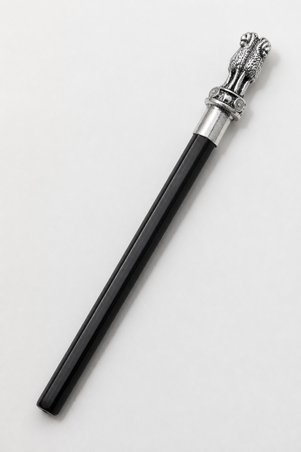 Ashoka Pillar silver-plated pencil topper fitted to a black pencil on an ivory background