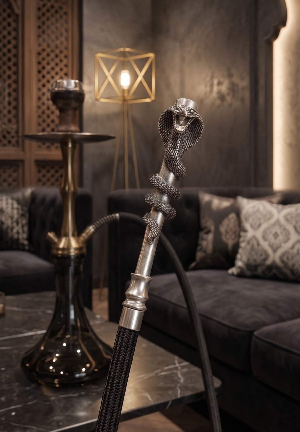 Coiled cobra hookah tip fitted to a hookah hose in a lounge setting