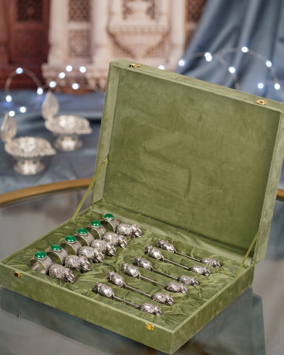 6 elephant napkin rings with stones and 6 elephant spoon rests in pure silver plating, laid in an open velvet gift box