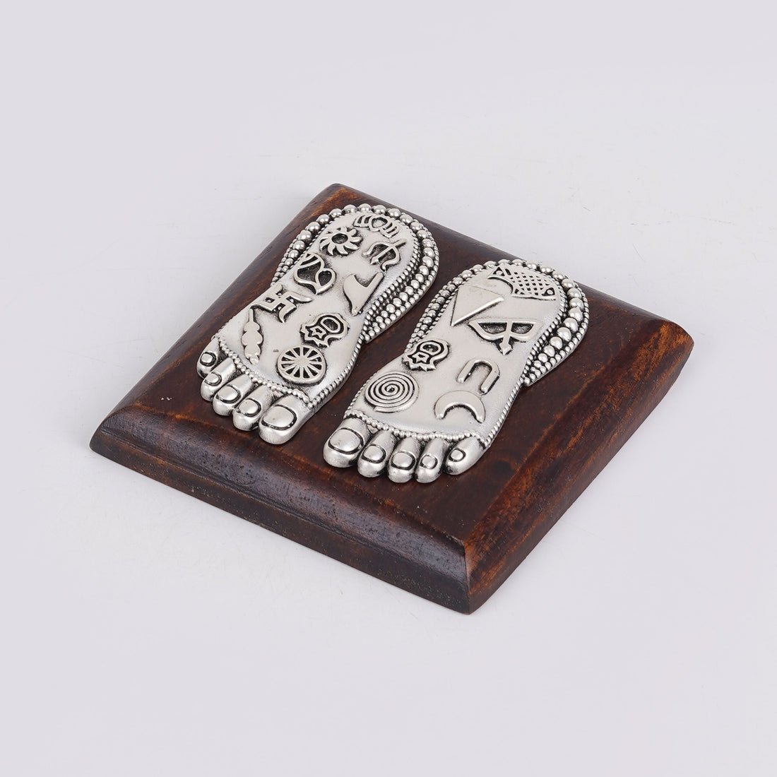 Lakshmi Charan foot silver charm on square wooden base