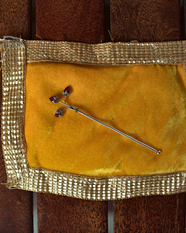 Trishakti silver-plated tilak stick with three ruby-coloured lotus buds